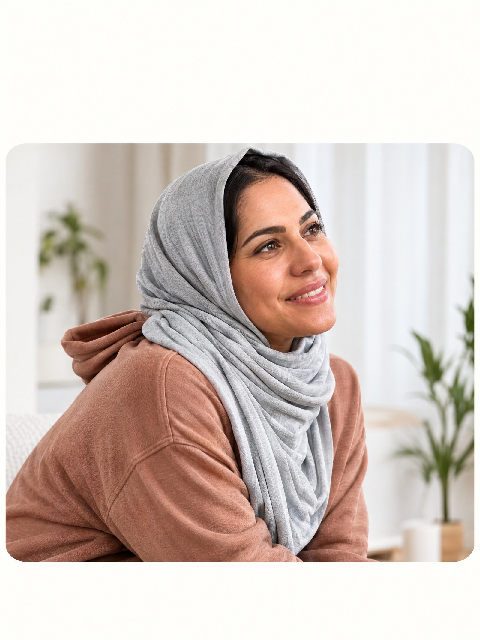 Zehra smiling in a warm sweater